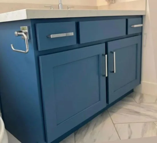 Bathroom vanity cabinet painting service in Salt Lake City with bold blue moisture-resistant finishes for durability and style.