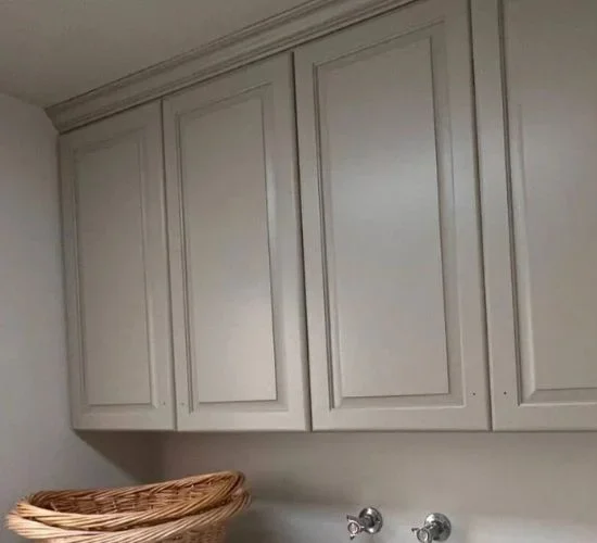 Laundry cabinet painting service in Salt Lake City with durable light finishes that resist daily wear and keep storage areas looking fresh.